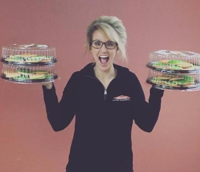 SERVPRO cookies delivered to firefighters in Vincennes, Indiana; woman with cookies image